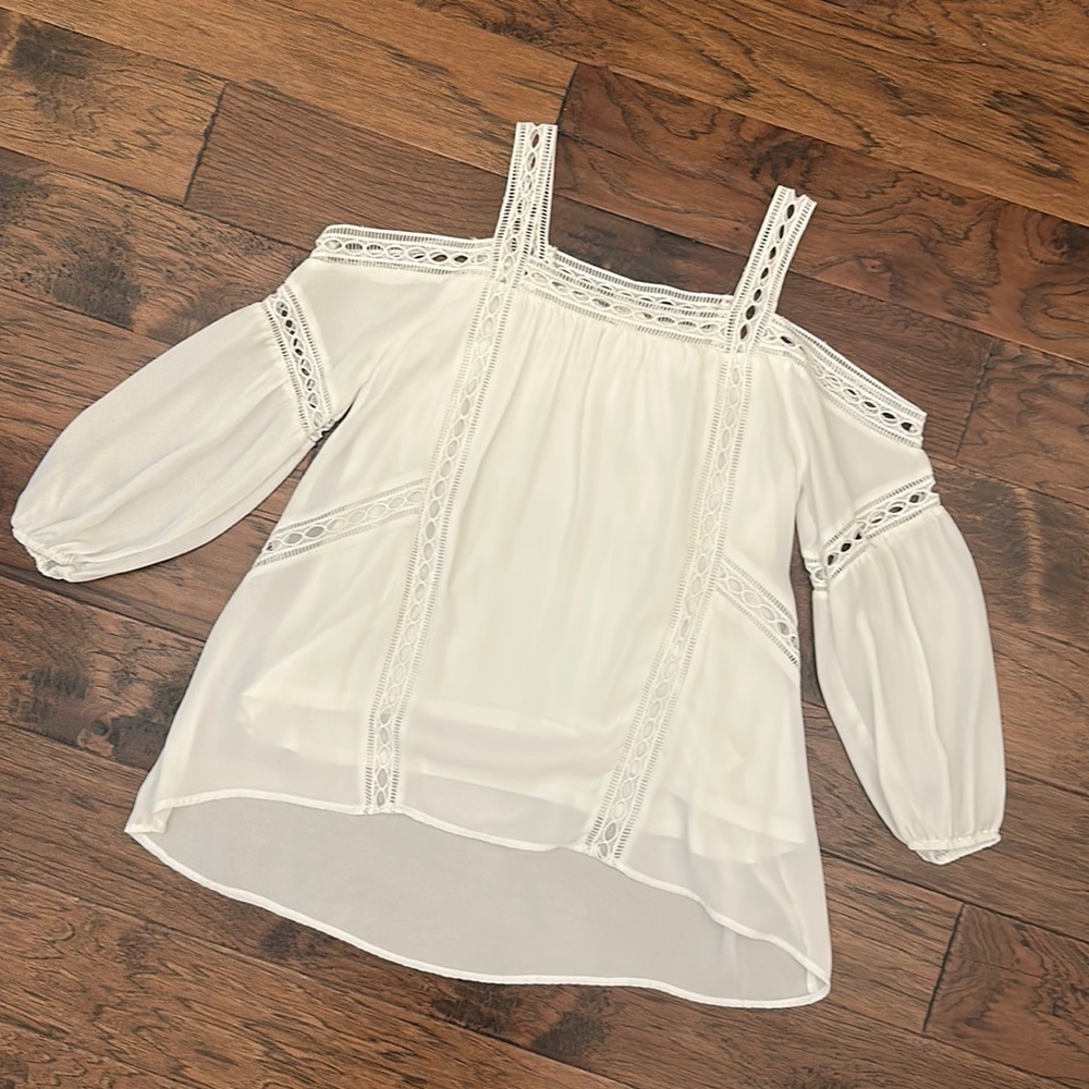 Dry-cleaned and like-new white dressy blouse